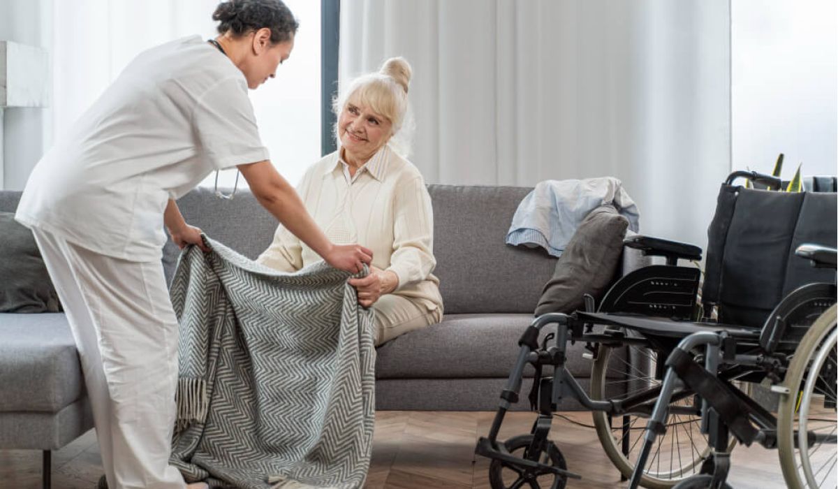 home carer with blanket